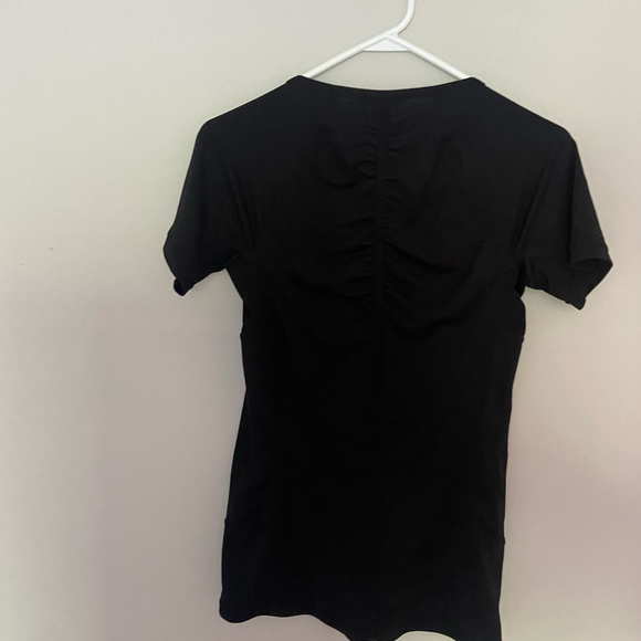 Athleta size medium short sleeved athletic shirt with front zipper - Picture 4 of 5